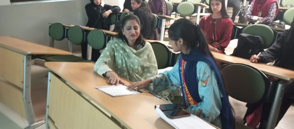 Seminar Participants involved in Wellness Mastery exercises in the session. Present is Dr. Durr-e-Shehwar Sagheer, Director Volunteer in Service Directorate, Capital University of Sciences and Technology